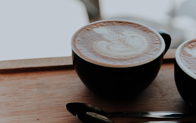 Close-up of cappuccino on table