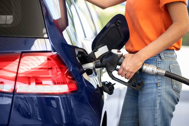 Close up on car care fueling