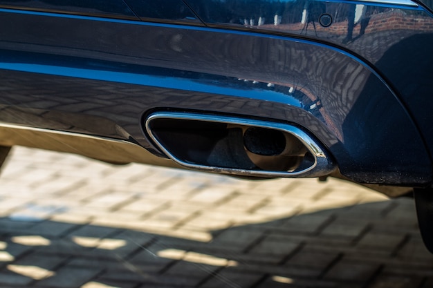 Close up of a car exhaust pipe. Exhaust pipe.