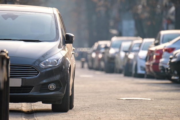 Photo close up of a car parked illegally against traffic rules on pedestrian city street side