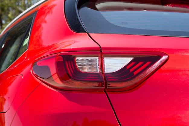 Close up  car rear tail light with a tail light stop signal.