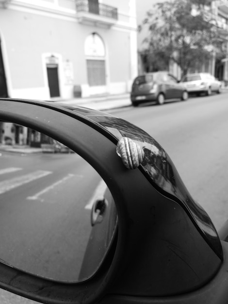 Close-up of car on street