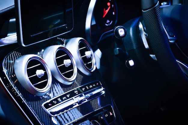 Close up car ventilation system and air conditioning - details and controls of modern car.