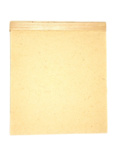 Photo close-up of cardboard on white background