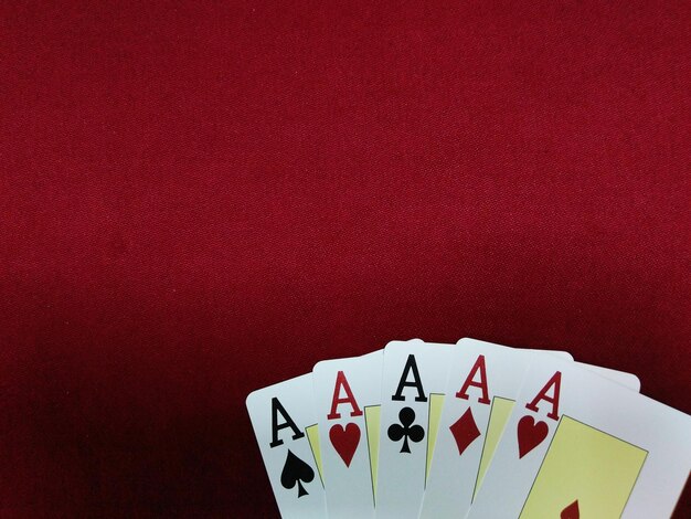 Photo close-up of cards on red background