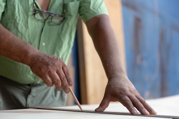 Close-up of carpenter hands working