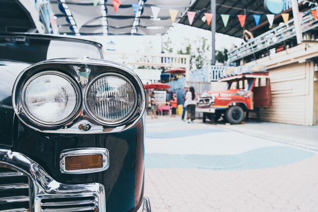 Photo close-up of cars on street in city