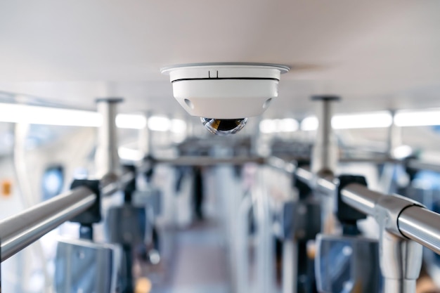 Close up to cctv backside from top view in the inside of the train with blur background