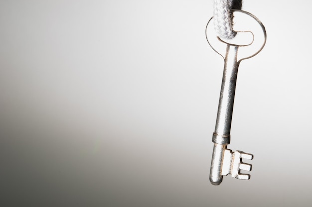 Photo close-up of chain against white background