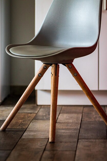 Photo close-up of chair on hardwood floor