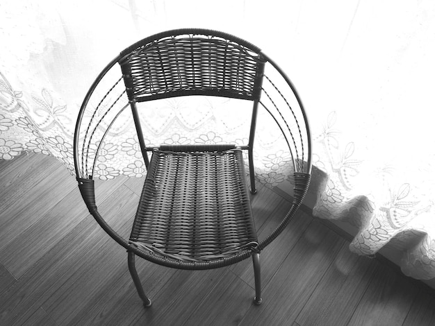 Photo close-up of chair on table at home