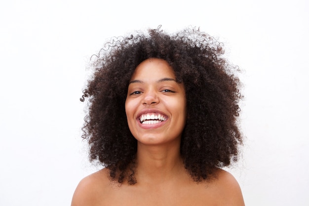 Close up cheerful african american woman with bare shoulders