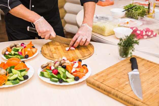 Close-up of chef cooking food