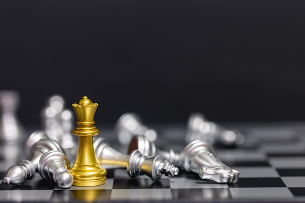 Close-up of chess pieces against black background