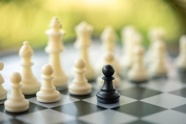 Close-up of chess pieces outdoors