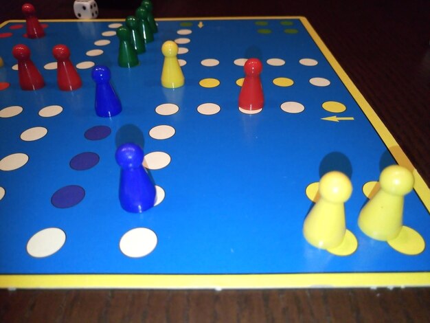 Close-up of chess pieces on table