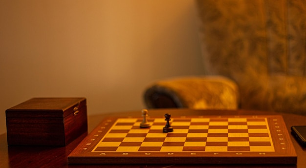 Close-up of chess pieces on table