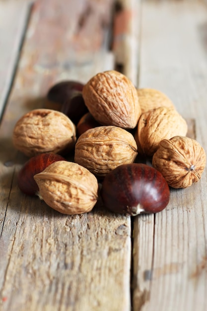 Close-up of chestnuts on wooden table