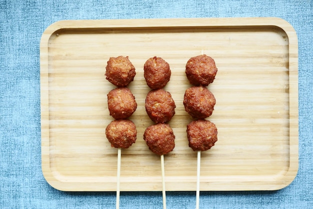 Close up of chicken cheese meat ball on plate