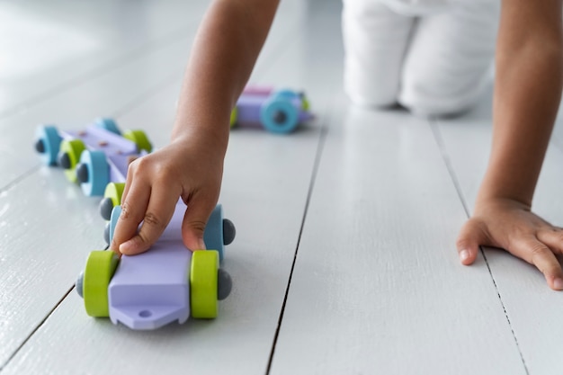 Photo close up on child enjoying didactic game