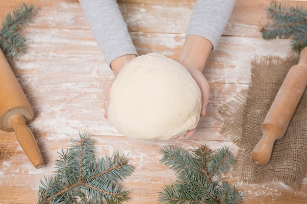 close up child making dough