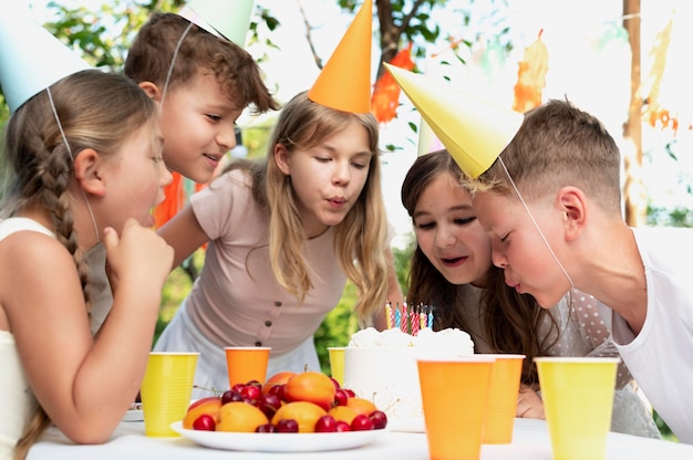 Close up children with delicious cake