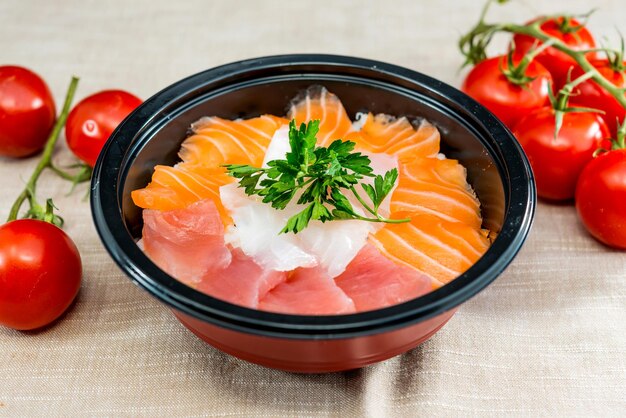 Close-up of chirashi served in bowl on table