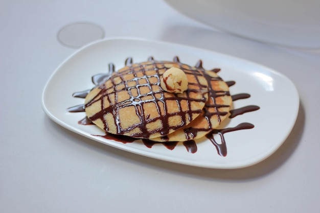 Photo close-up of chocolate cake in plate