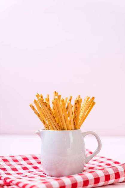 Close-up of chocolate cake on table against white background