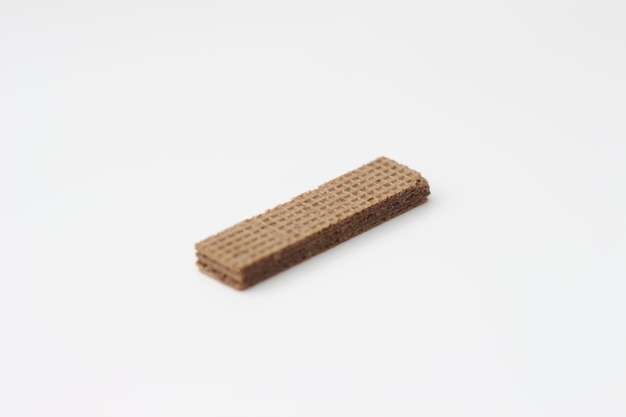 a close up of chocolate wafers isolated on white background