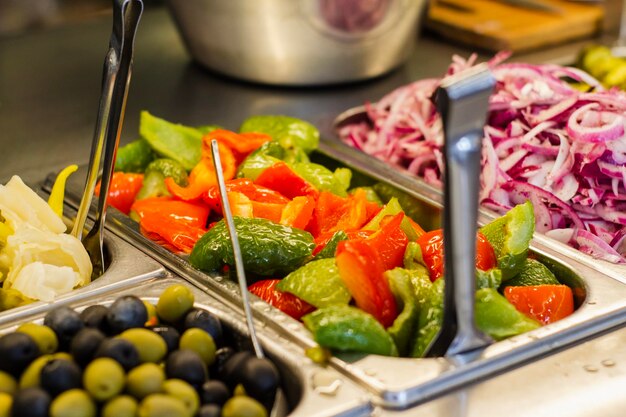 Close-up of chopped fruits in plate on table