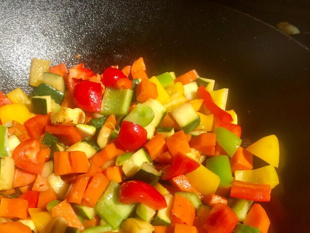 Close-up of chopped fruits and vegetables on plate