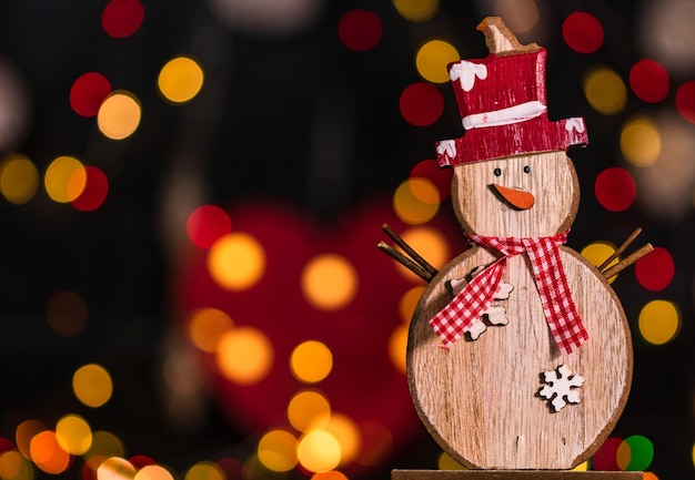 Photo close-up of christmas decoration against illuminated lights