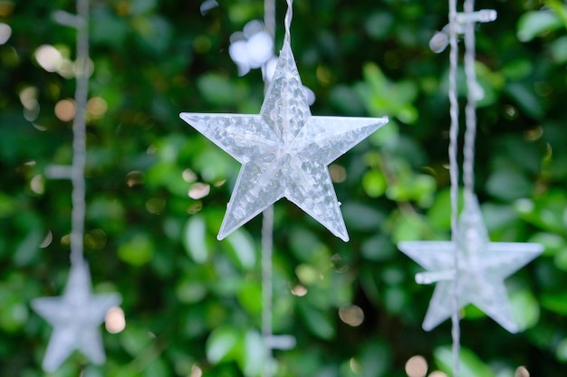 Close-up of christmas decoration hanging on tree during winter