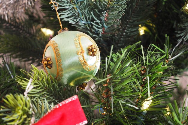 Photo close-up of christmas decoration hanging on tree