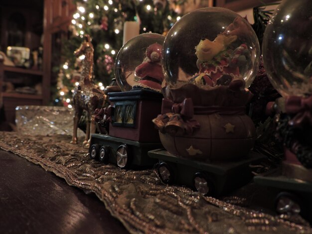 Photo close-up of christmas decoration on table at home