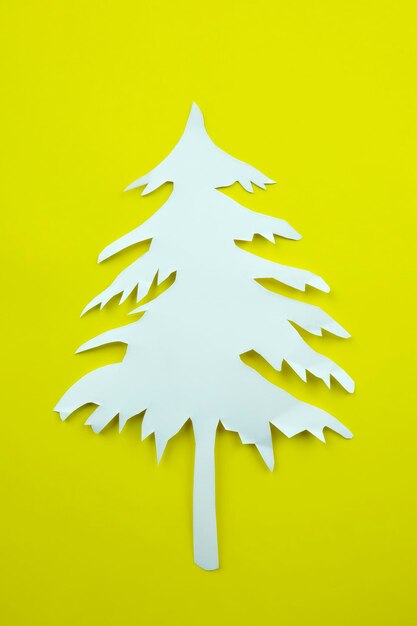 Photo close-up of christmas decoration on yellow wall