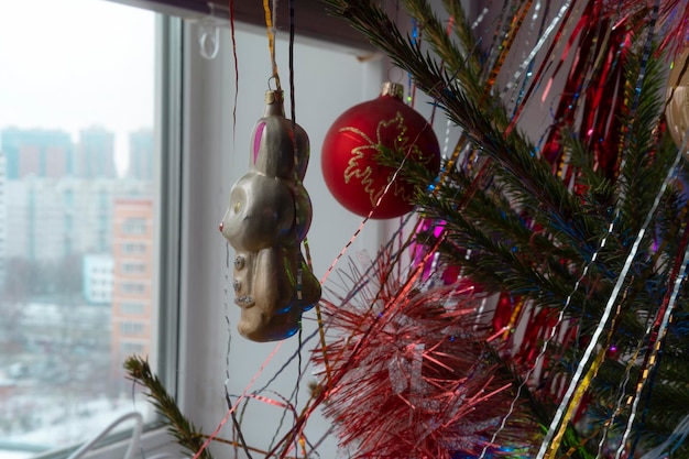 Photo close-up of christmas decorations hanging on building