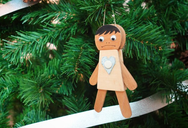 Close-up of christmas decorations hanging on tree