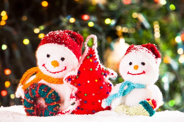 Close-up of christmas decorations in snow