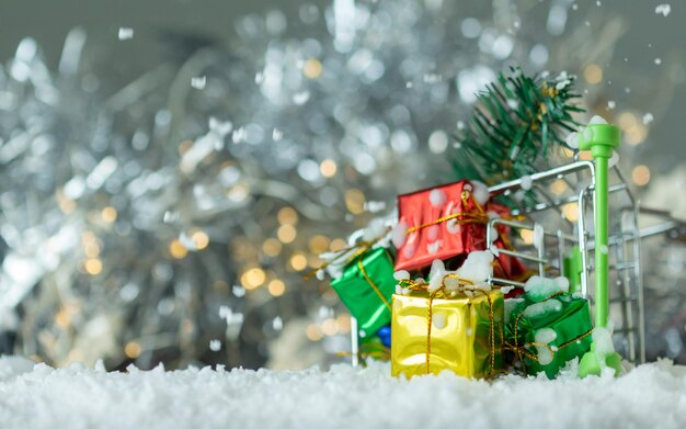 Close-up of christmas decorations on snow