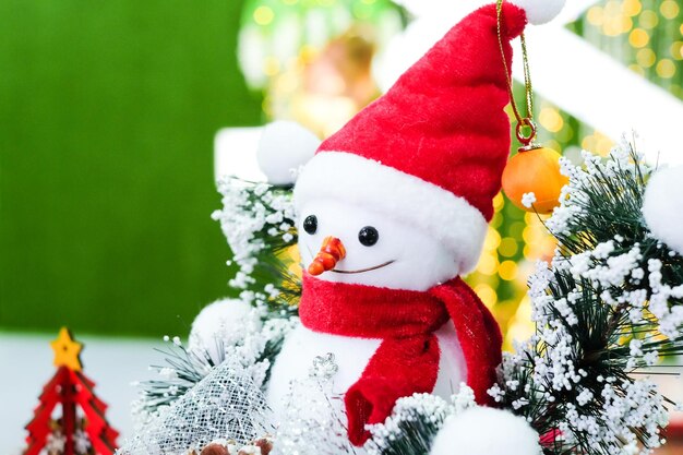 Close-up of christmas decorations in snow