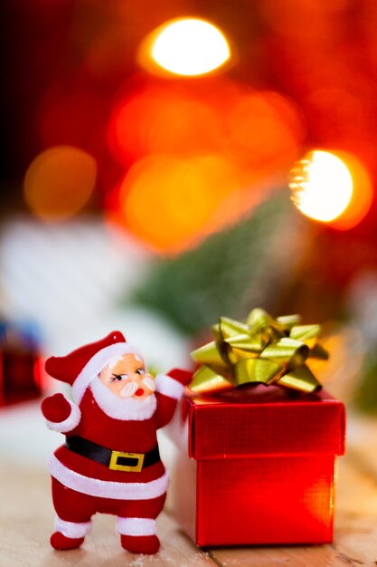 Close-up of christmas decorations on table against defocused lights