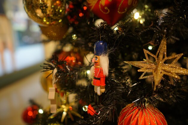 Photo close-up of christmas decorations on tree