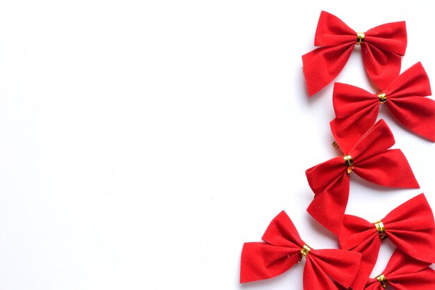 Photo close-up of christmas decorations over white background