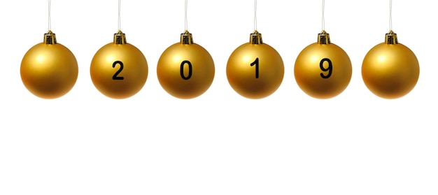 close-up of christmas ornaments with numbers hanging against white background