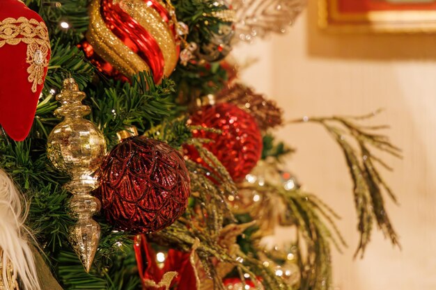 Photo close up at the christmas tree with balls and toys