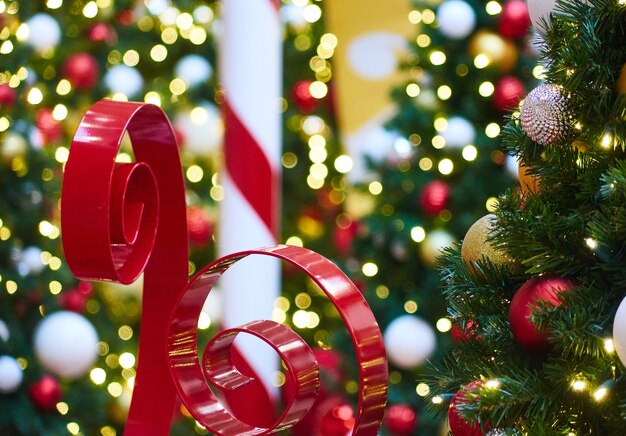 Close-up of christmas tree with decorations at night