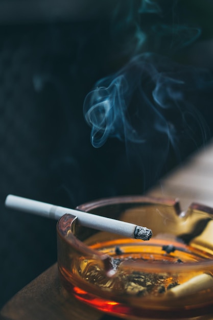 close-up of cigarette in ashtray