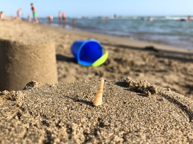 Photo close-up of cigarette on beach